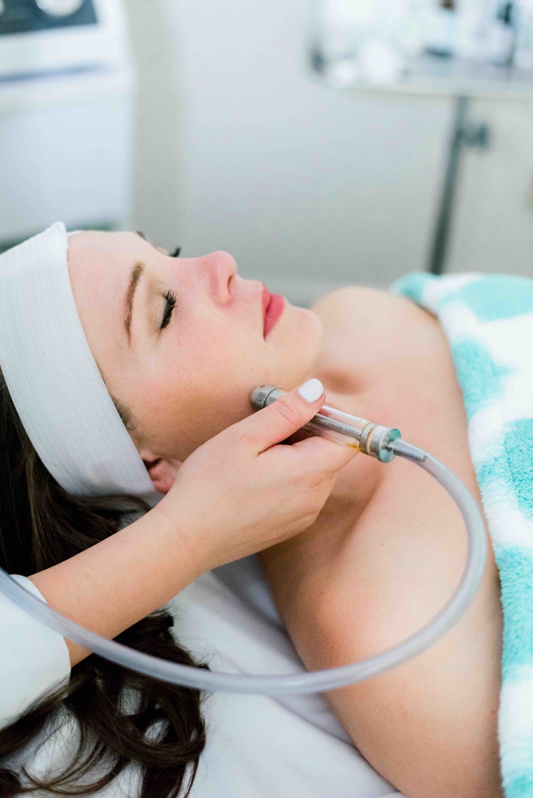 An Aesthetician in Richmond, VA performing microdermabrasion on fair skin