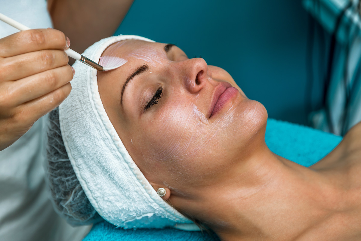 A woman receiving a chemical peel at a Richmond med spa.